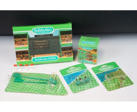 Subbuteo - Five boxed / carded accessories to include scoreboard, dugout/subs, officials, goalkeepers (card split) and TV Tow