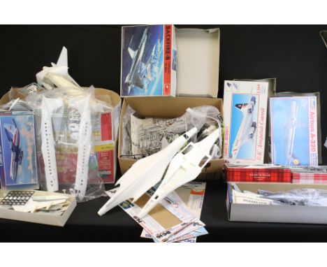 Large quantity of plastic model kit parts and spares to include plane bodies, bagged kits on spruces, decals, empty boxes etc