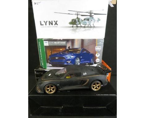 Four boxed R/C models to include 1/10 scale Carisma Renault F1 Team M-01, Vaterra 1/10 scale 2015 Mustang, 2 x Lynx Hubsan R/