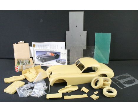 Boxed 1/8 scale RAE Models Jaguar XK120 Roadster Fixed Head diecast model kit, appearing complete and unbuilt, with instructi