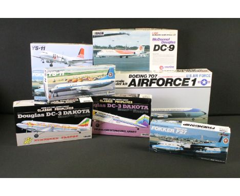 Nine boxed Doyusha 1/100 - 1/144 plastic model plane kits to include 1/100 Airforce 1 Boeing 707, 1/100 Ethiopian Douglas DC-
