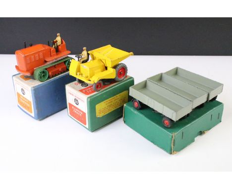Group of Dinky farm related diecast models to include boxed 562 Dumper Truck in yellow, boxed 563 Heavy Tractor in orange and