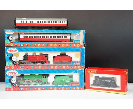 Two boxed Hornby Thomas &amp; Friends OO gauge locomotives to include James the red engine and Henry the green engine plus a 