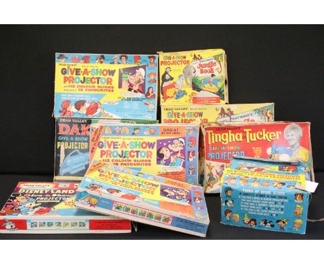 Nine boxed Chad Valley Give A Show Projector sets to include point of sale display Packs Of Spare Slides (complete), 2 x Jung