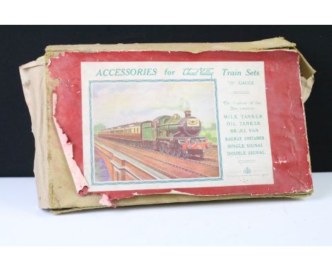Boxed Chad Valley O gauge Accessories Set containing Milk Tanker, Oil Tanker and 2 x BR Vans, tatty boxes 