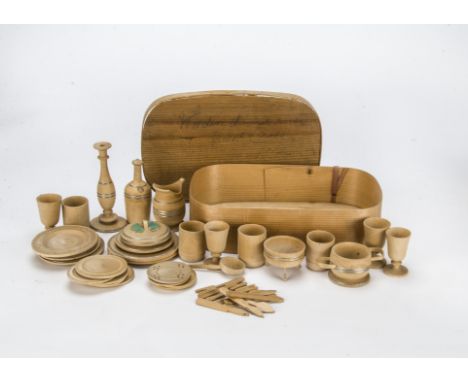 A German 19th century wooden dinner service,  Turned wood comprising plates, water glasses, wine glasses and cutlery, additio