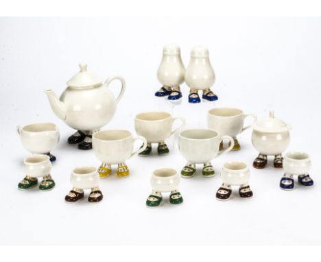 A Carltonware Walking Ware breakfast set,  Comprising teapot, four tea cups, five egg cups, salt &amp; pepper, milk jug and l