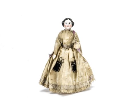 A large scale china shoulder-head dolls’ house doll,  With black centre-parted moulded and painted hair, blue eyes, pink chee