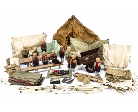 A Toy Boy/Sea Scout encampment,  The Plymouth Division Deep Sea Scouts including Japanese celluloid Akela Scout Leader —7in. 