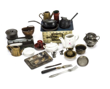 Dolls’ house kitchen items, A tinplate range —4½in. (11cm.) high (missing base); cast metal pots and pans, possibly Britains;