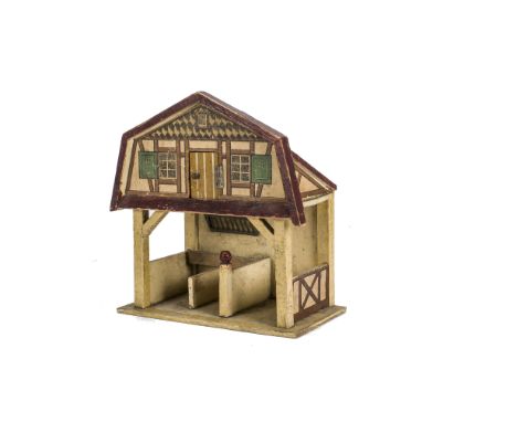 A Gottschalk dolls’ house stable,  Painted cream with brown roof, printed paper first floor facade and side detail, two stall