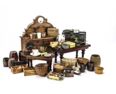 A home-made dolls’ buffet, With secret drawer —11½in. (29cm.) high; various barrels, crates of food, a doll’s egg postal box;