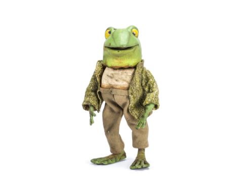 A Bura &amp; Hardwick stop-frame animation frog puppet, a foam-rubber articulated model in original clothes —12in. (30.5cm.) 