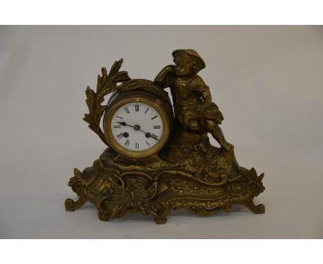 A 19th century cast gilt metal figural mantle clock with enamelled dial and twin train movement