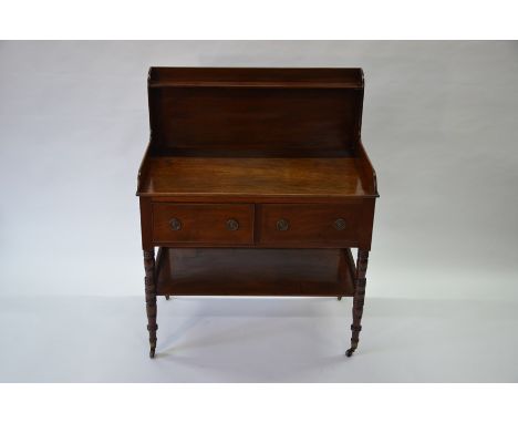 A Victorian mahogany night stand, the 3/4 galleried top over two frieze drawers and an undertier, on castors