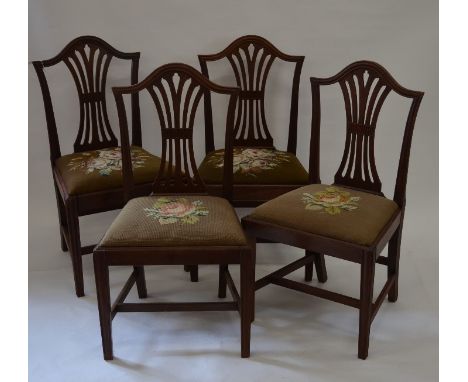 A set of four late 19th/20th century side chairs with pierced splats and tapestry covered drop-in seats (4)