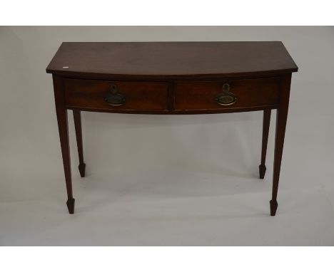 A 19th century mahogany bowfropnt hall table with two drawers, 110 cm wide