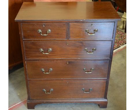 A small mahogany chest of two short over three long drawers raised on bracket feet, 91 cm high x 76 cm wide x 40 cm deep