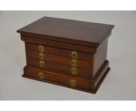 A 19th century mahogany table top collector's chest, with hinged lid and two short over three long drawers, fitted throughout