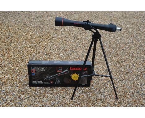A Tasco space station telescope on tripod (boxed)