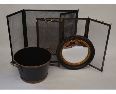 A rivetted metal twin handled planter/bucket painted black with gilt bands and oval polychrome panel depicting pond scene wit
