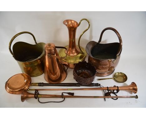 A brass coal scuttle and a copper scuttle, a bed-warming pan, skimmer, a ceramic pot, a conical copper container, a pitcher a