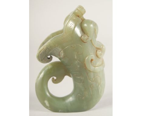 A CHINESE JADE HORN SHAPE LIBATION CUP, with carved chilong to the side, 11cm high.
