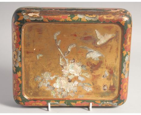 A JAPANESE LACQUERED WOOD AND MOTHER OF PEARL INLAID BOX, the hinged lid with mother of pearl flora, birds, and gilt decorati