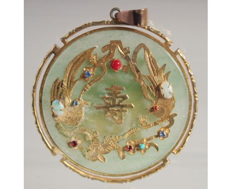 A CHINESE JADE AND YELLOW METAL GEM-SET CIRCULAR PENDANT, 6cm diameter.