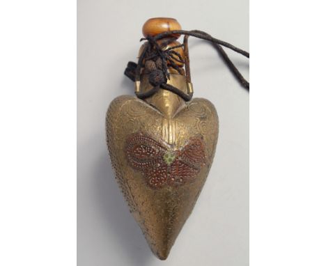 A RARE 18TH CENTURY TURKISH OTTOMAN RHINO HORN GUNPOWDER FLASK, inscribed to both sides, 22cm long.