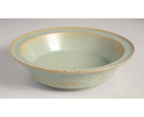 A CHINESE SONG STYLE CELADON BASIN, 22cm diameter.