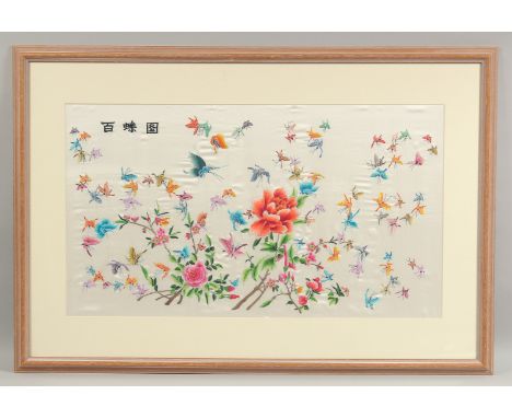 A LARGE 20TH CENTURY CHINESE EMBROIDERED SILK HUNDRED BUTTERFLY PANEL, framed and glazed, 67cm x 97cm overall.