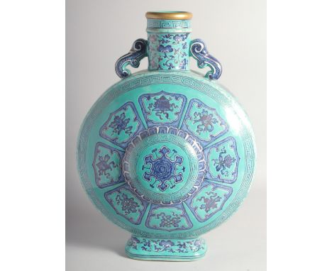 A VERY LARGE CHINESE TURQUOISE GROUND PORCELAIN TWIN HANDLE MOON FLASK VASE, decorated with bajixing symbols, bearing Qianlon