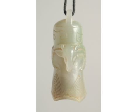 A CHINESE CARVED JADE PENDANT on string, jade 6cm.