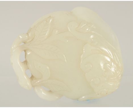 A FINE QUALITY CHINESE CARVED AND PIERCED JADE FRUIT, 5cm.
