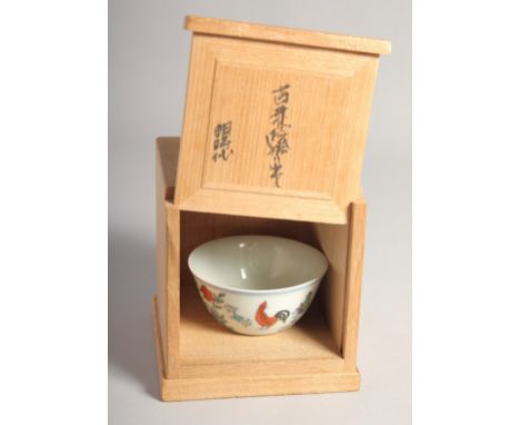 A CHINESE PORCELAIN CHICKEN CUP, six-character mark to base, together with inscribed wooden box.