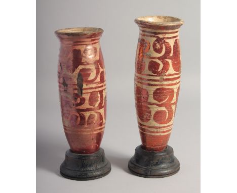 A RARE 16TH/17TH CENTURY PAIR OF HISPANO MORESQUE COPPER LUSTRE ALBARELLO JARS / VASES on later removable stands, 29cm and 27