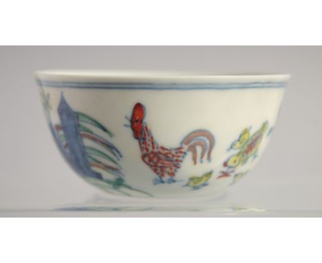 A CHINESE DOUCAI PORCELAIN CHICKEN CUP, 8cm diameter.