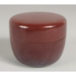 A JAPANESE LACQUER NATSUME / TEA CADDY, with draw-string sleeve in original fitted box, 7.5cm