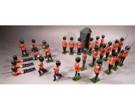 Britains various Foot Guards nine marching with officer and pioneer (pioneer ankles broken), seven firing with three officers