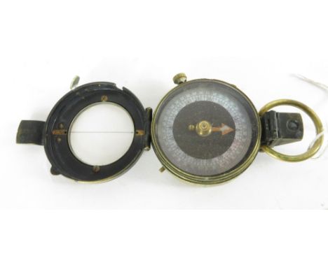 A WWI period Engineer Corps Marching compass in brass case, no. 26204, dated 1918 and in original leather belt pouch