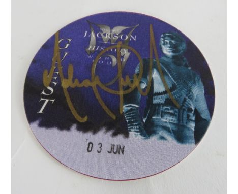 Michael Jackson - History World Tour, 3rd June, circular Guest" mat autographed in gold pen"