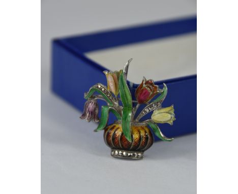 An enamel and marcasite set giardinetto brooch, stamped '935', probably German, with a pair of matching earclips