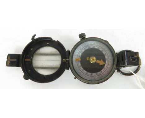 A WWII period marching compass in lacquered brass case and with pearlescent dial, by F. Barker &amp; Sons, London, dated 1939