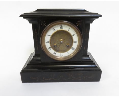 A 20th Century slate mantel clock with a white enamel dial