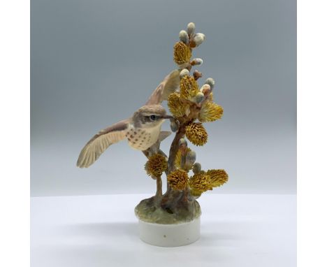 Beautifully detailed figurine depicting a vermilion flycatcher taking flight from a pussy willow. Royal Worcester and Dorothy