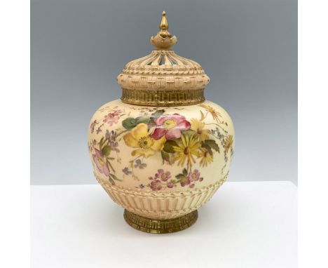 A gorgeous fine China potpourri vase with hand-painted flowers on an ivory ground and reticulated lid with basket weave patte