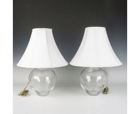 Pair of Simon Pearce Shelburne blown crystal table lamps with bulbous shapes and pontil marks; their folds capture and brilli