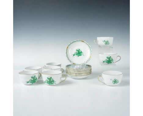 8 cups and matching saucers hand-painted with green Chinese Bouquet and Gilded edge. Cups measures 4.5"L x 3.75"W x 2"H. Sauc