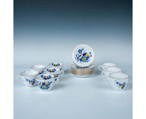 A set of 8 teacups and 8 saucers decorated with wild birds and autumn produce painted in shades of blue and yellow. Spode bac
